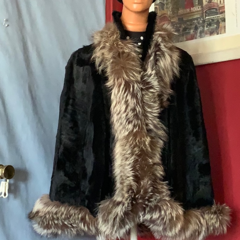 Real fur with fox fur around cape one size fits all